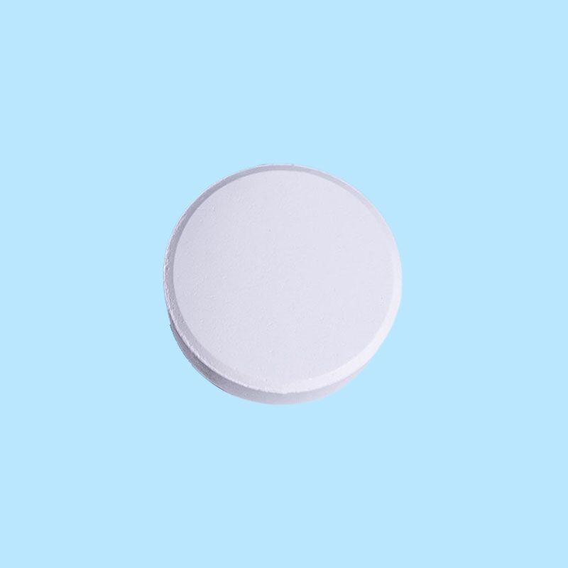 Cyanuric Acid (CYA) 98.5% Clorine Tablets: The Effective Chlorine Stabilizer and Sanitizer 2 Close up image of Cyanuric Acid Tablet for pool maintenance.