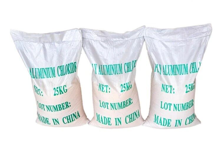 Unleashing the Power of Polyaluminum Chloride for Rapid and Effective Water Clarification 3 3 bags of Polyaluminum Chloride (PAC) used for water treatment applications.